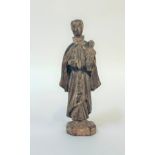A Continental carved wooden figure of St. Anthony of Padua, probably 17th/early 18th century,
