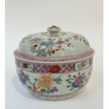 A Chinese porcelain bowl and cover of kamcheng type, polychrome painted with flowering boughs and