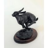 •Belinda Sillars (British, 20th Century), Hare in Motion, a patinated bronze limited edition
