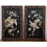 A striking pair of Japanese inlaid lacquer panels, Meiji period, late 19th century, of rectangular