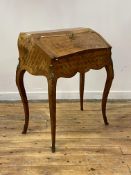 A Louis XV style kingwood and parquetry bureau de dame, early 20th century, the top, slant, and