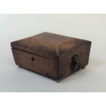 An early 19th century inlaid mahogany jewellery box, of sarcophagus form, with chequered band inlay,