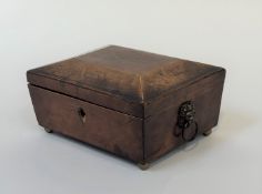 An early 19th century inlaid mahogany jewellery box, of sarcophagus form, with chequered band inlay,