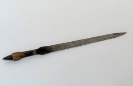 A long African dagger, the steel blade with metal-mounted horn grip, in a leather sheath. Length