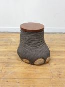 Taxidermy, an elephant foot lidded stool, with circular teak cover and lined interior. H48cm.