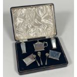 A George V silver condiment set, Deakin & Francis, Birmingman 1932-34 (three date marks), in the Art