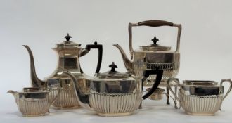 A late Victorian assembled five piece silver tea service, the teapot, coffee pot, cream and sugar