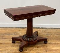 A mid 19th century plum pudding mahogany fold over tea table, the well figured top folding and