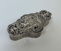 An Edwardian silver trinket box, William Comyns & Sons, London 1905, of cartouche form, the hinged