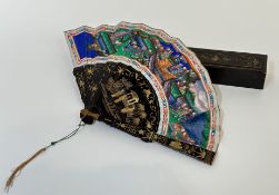 A 19th century Chinese painted paper and ivory-applique lacquer fan, the paper leaves decorated with