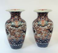 A pair of large Japanese Imari porcelain vases, Meiji period, c. 1900, of baluster form, painted