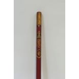 An Edward VII Coronation "Gold Staff" staff officer's baton, in red with gilt tips, dated 1902.