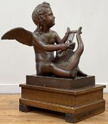A large patinated metal figure of a putto playing a lyre, 20th century, on an integral rectangular