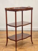 An Edwardian tray top occasional table of serpentine outline, the top with a removable drinks tray