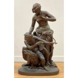 After Arthur Waagen (German 1833-98), a large patinated metal group of Cupid and Psyche, he
