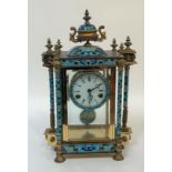 A French brass and champleve enamel four glass mantel clock, mid 20th century, the case with urn