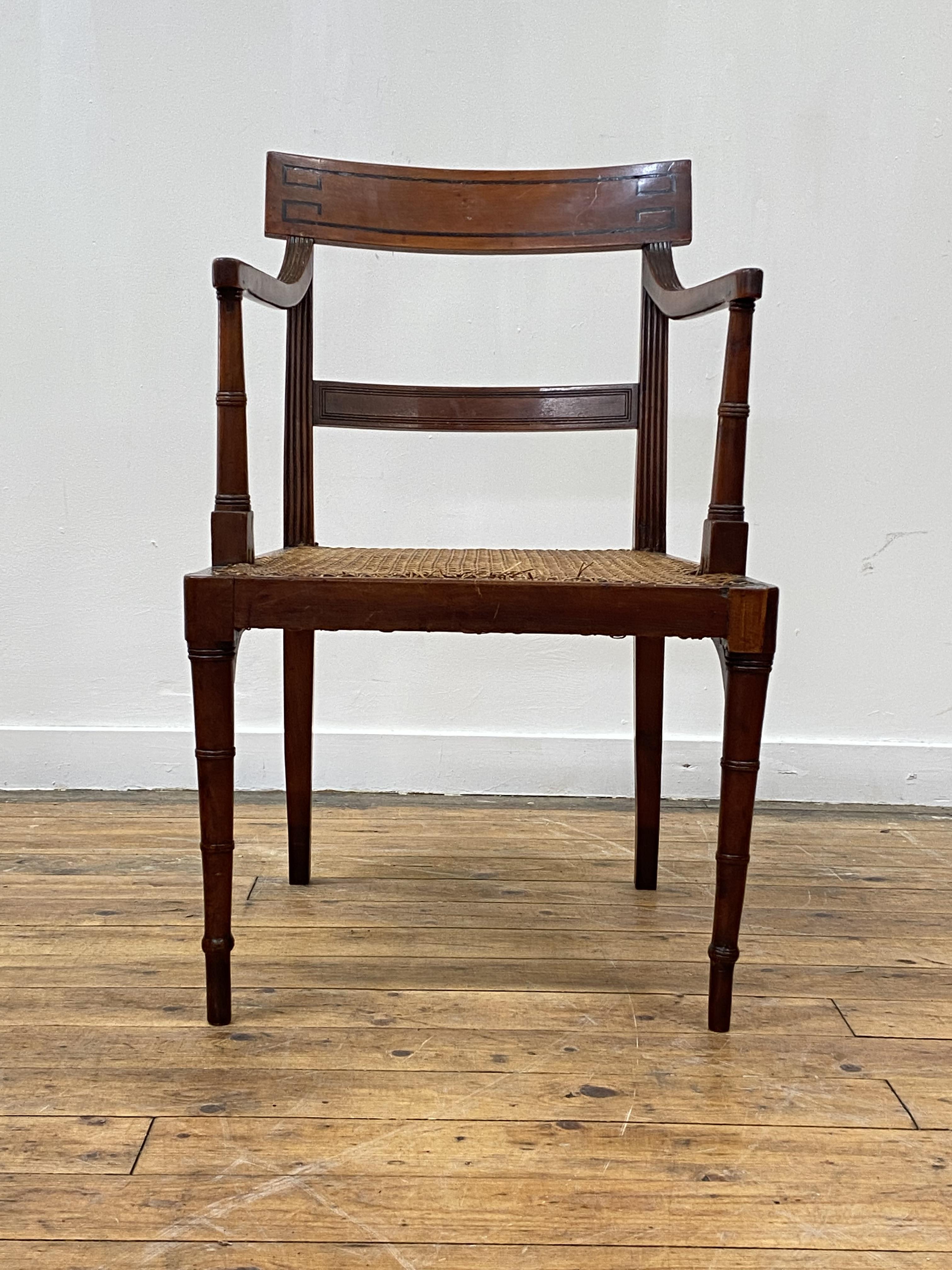 A Regency period yew wood elbow chair, the crest rail inlaid with ebony bands, above reeded open - Image 3 of 5