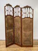An Edwardian Sheraton revival satinwood bi-fold room screen, each panel painted with scrolling