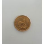 South Africa, 1974 gold full Krugerrand, obv; portrait of Stephanus Johannes Kruger, rev;