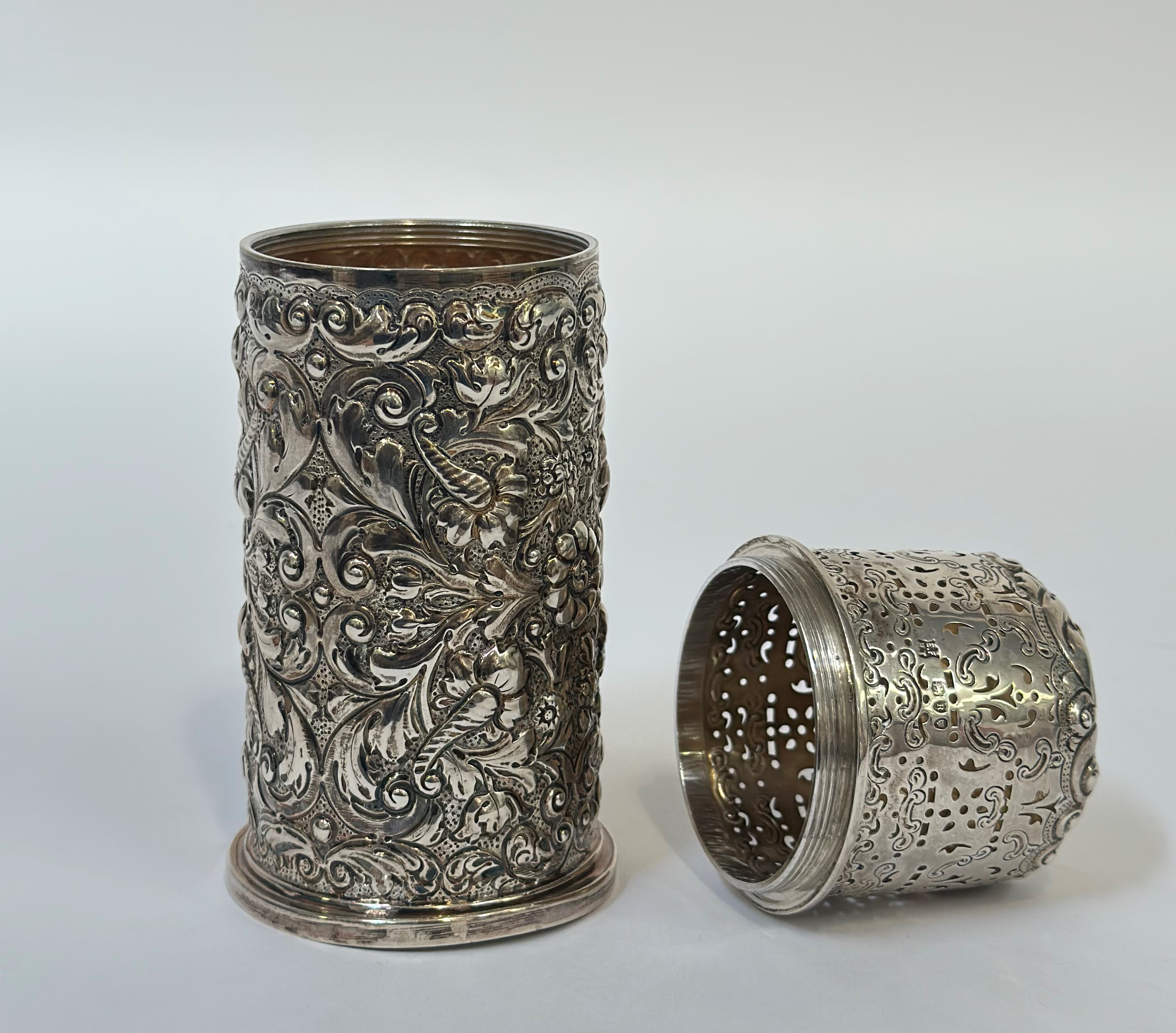 A late Victorian silver sugar caster, Horace Woodward & Co., London 1892, of cylindrical form, - Image 2 of 3