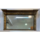 A Victorian giltwood and gesso framed over mantel mirror of rectangular outline, the inverted