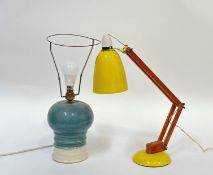 A ceramic studio pottery table lamp with blue and white glazing (h-40cm) and a wooden arm yellow mac