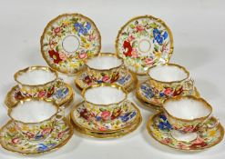 A Hammersley china eighteen piece part teaset including six side plates, five scalloped edge teacups