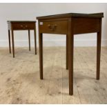 A pair of early 20th century mahogany bedside tables, early 20th century, with ledge back, plate