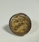 A George V gold sovereign, 1927, mounted in 9ct gold ring (W/X) (total: 14.13g)