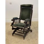 An American style stained walnut rocking chair, H105cm