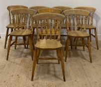 A matched set of eight (6+2) Farmhouse beech dining chairs, with spindle backs