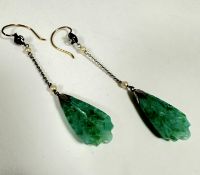 A pair of celadon coloured jadeite triangular shaped carved leaf pendant earrings with paste pearl
