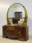 Tri-Bond, an impressive Art Deco period walnut dressing table, the oval bevelled mirror back with