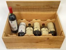A mixed part case of wine comprising four bottles of 1982 Chateau Bellevue La Selourde Bordeaux