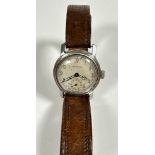 A vintage brass chromium plated gentleman's Pilot style wristwatch with enamelled dial and roman