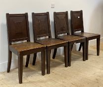 A Set of four 19th century country oak dining chairs with panel back and seat raised on square
