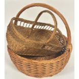 A large wicker circular loop handle vegetable basket (including handle: 43cm x d.38cm) and a vintage