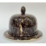 A Macintyre pottery marbled/agateware cheese dome with brown/white slip decoration and acorn