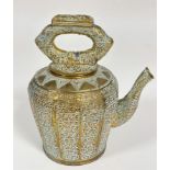 An unusual Middle Eastern teapot with hinged cap to top of handle and panelled sides, all with