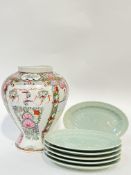 A modern Chinese famille rose baluster vase and a set of six oval Celadon goldfish decorated