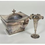 A Sheffield plated Adam style tea caddy with domed cover, with upswept corners and urn style finial,