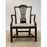 A Georgian mahogany elbow chair, splat back, swept open arms, drop in seat pad, square chamfered
