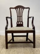 A Georgian mahogany elbow chair, splat back, swept open arms, drop in seat pad, square chamfered