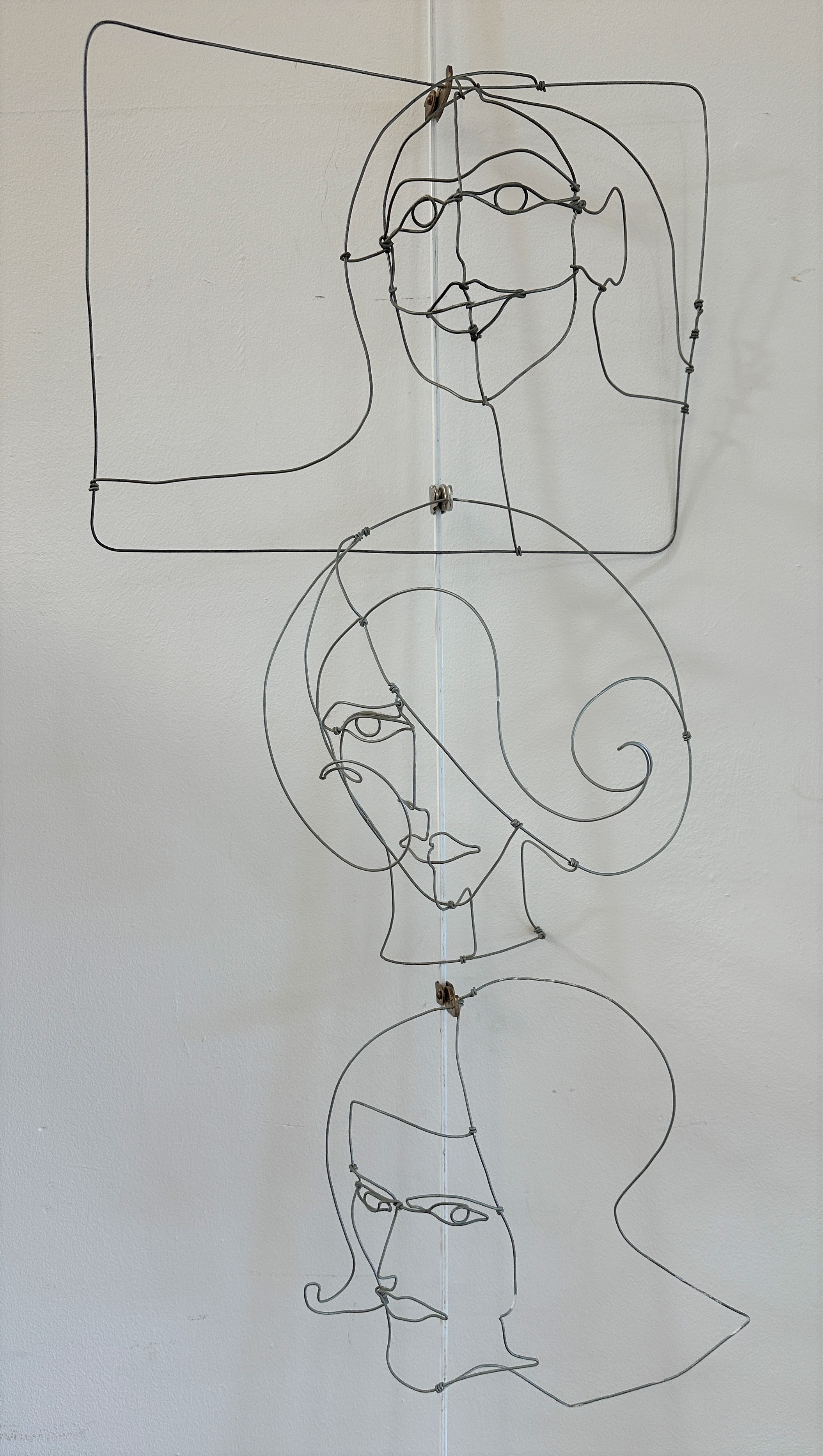 Unknown artist, a group of three wirework relief portraits (largest: 29cm x 38cm smallest: 27cm x