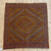 A Mashwani Gazak rug, the field of overall lozenge design with running dog motif and bordered