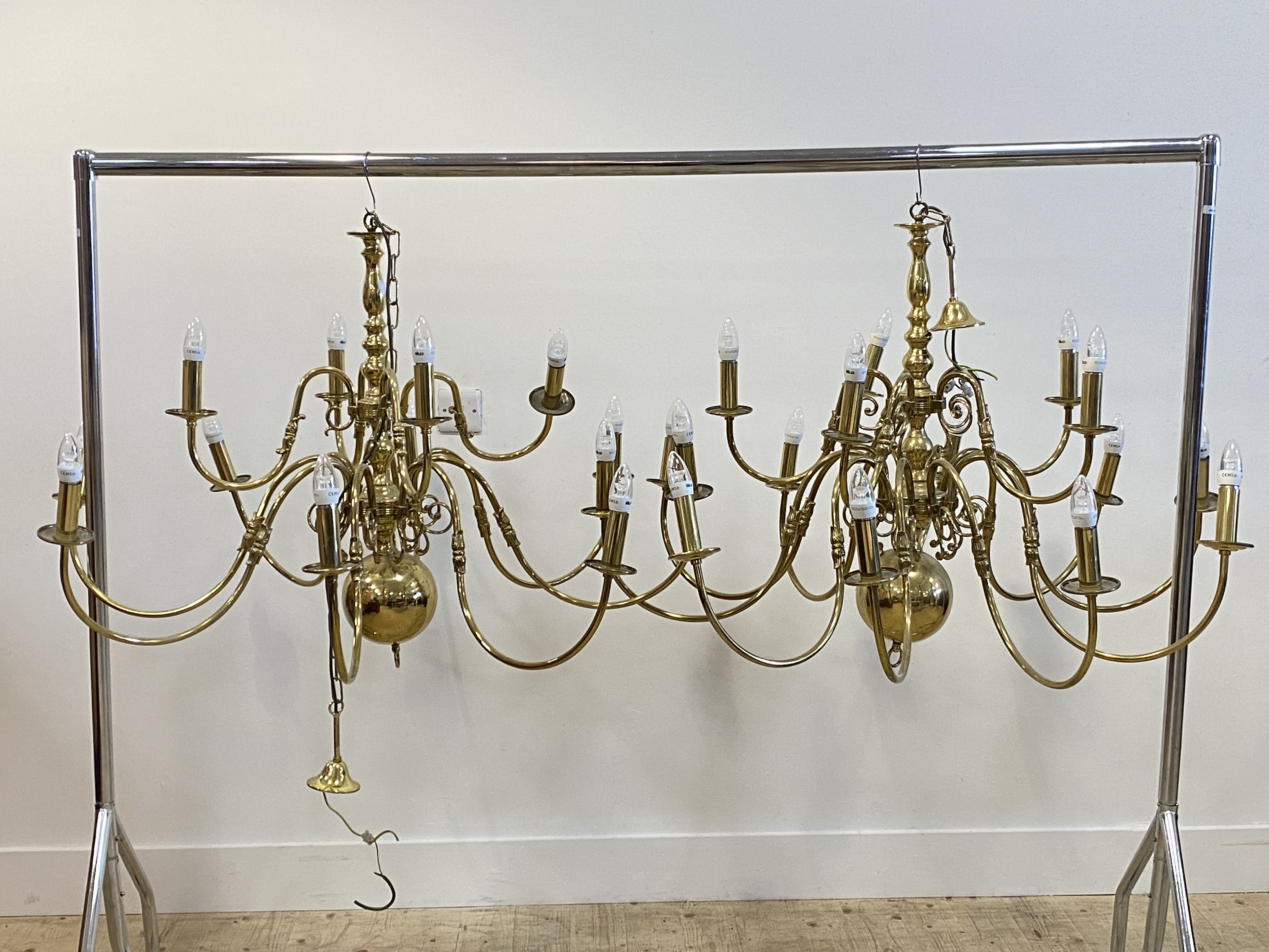 A pair of gilt lacquered brass Dutch style brass chandeliers, each with central column issuing 15