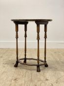 A walnut occasional table of 18th century design, circa 1920's, the scalloped top with parcel gilt