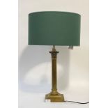 An Edwardian brass Corinthian column table light, with well cast acanthus capitol over fluted and