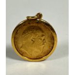 An Edward VII gold half sovereign, 1909 in 9ct gold mount with ring to top
