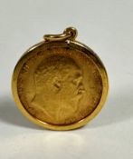 An Edward VII gold half sovereign, 1909 in 9ct gold mount with ring to top